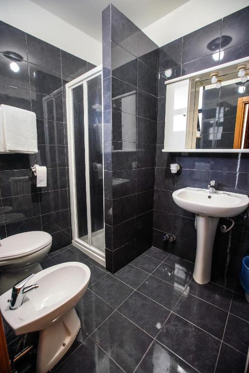 Koupelna v ubytování Hotel Murgia