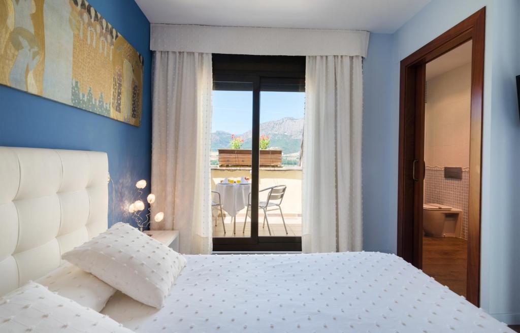 Posteľ alebo postele v izbe v ubytovaní Hotel Restaurant Cal Petit