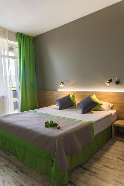 Postel nebo postele na pokoji v ubytování Hotel Vesna