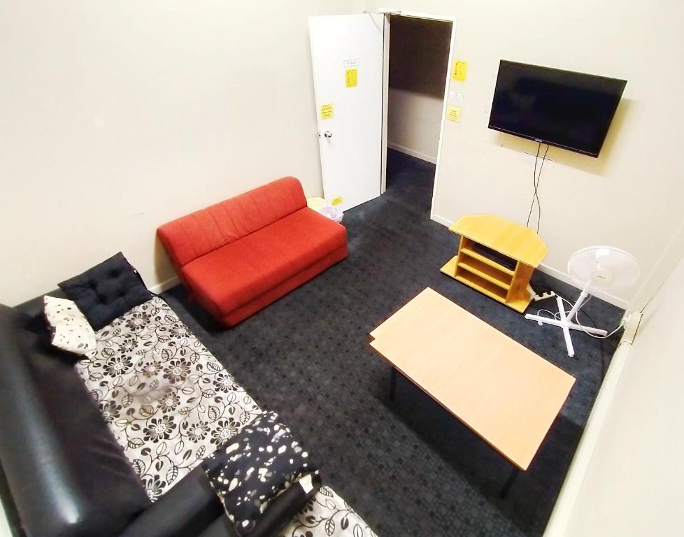 TV a/nebo společenská místnost v ubytování Surf 'N' Snow Backpackers