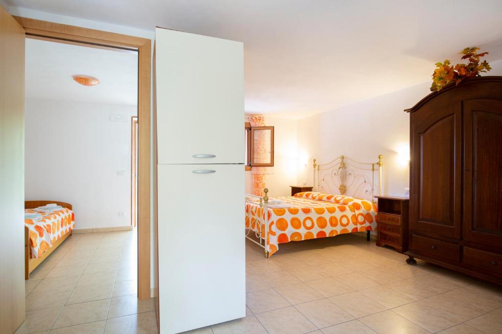 Łóżko lub łóżka w pokoju w obiekcie Agriturismo Posta Pastorella