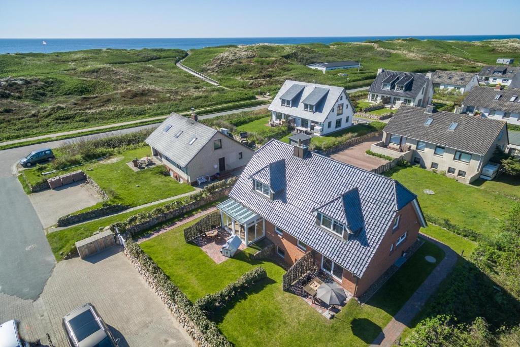 an aerial view of a large house at Am Sandwall Westseite in Rantum