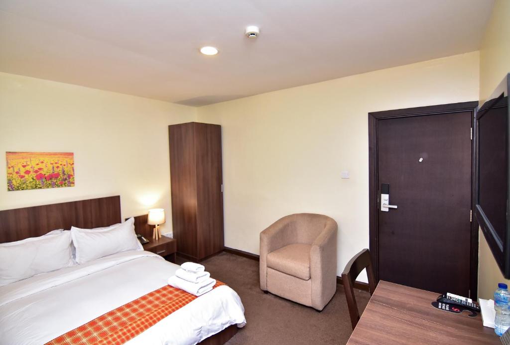 Postel nebo postele na pokoji v ubytování Sinclair Guest House