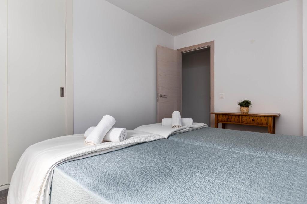 Posteľ alebo postele v izbe v ubytovaní Acapulco Apartments