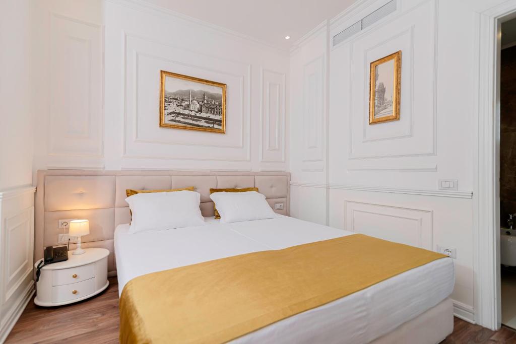 Postel nebo postele na pokoji v ubytování Eler Hotel