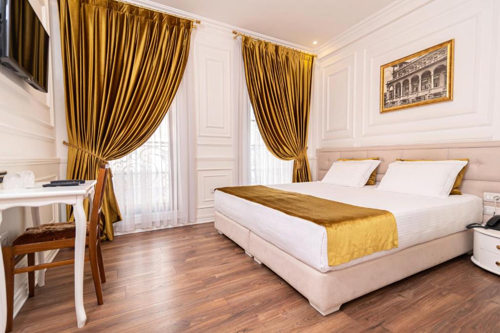 Postel nebo postele na pokoji v ubytování Eler Hotel