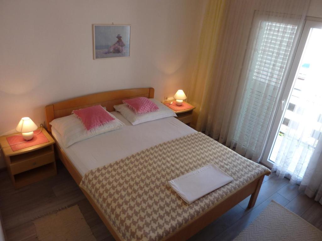 Postel nebo postele na pokoji v ubytování Three bedroom apartment & studio - Apartments Ždrijac