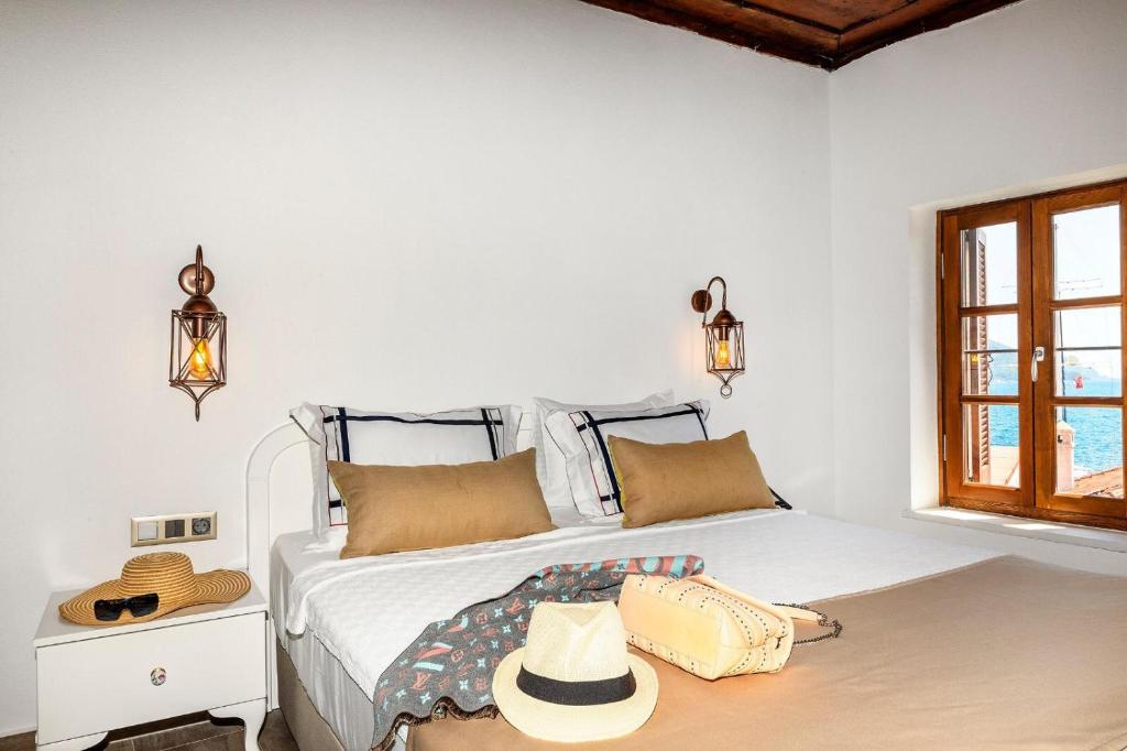 Postel nebo postele na pokoji v ubytování Mets Boutique Hotel
