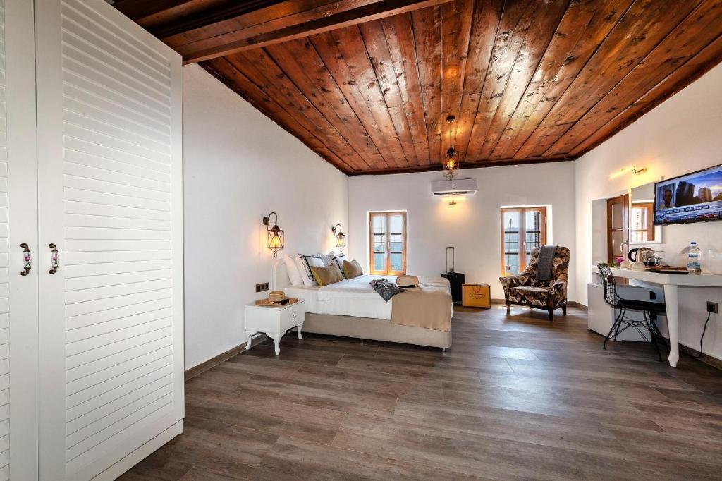 TV a/nebo společenská místnost v ubytování Mets Boutique Hotel
