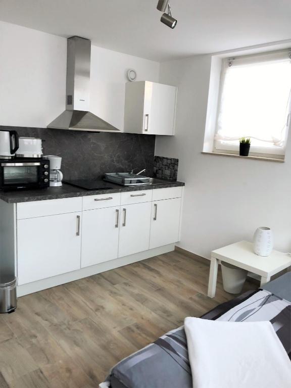 Ferienwohnungen Lamisto am Waldesrand - Studio At The Basement With Shared Bathroom