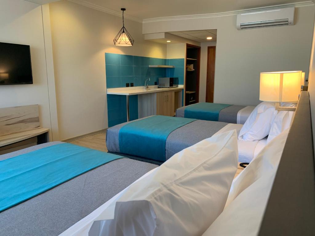 Una cama o camas en una habitación de Hotel Diego de Almagro Temuco Express