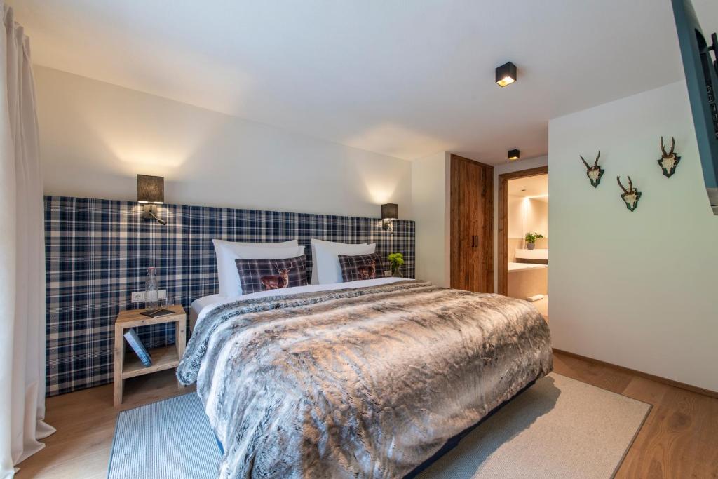 Postel nebo postele na pokoji v ubytování Brunnenhof Luxury Apartments