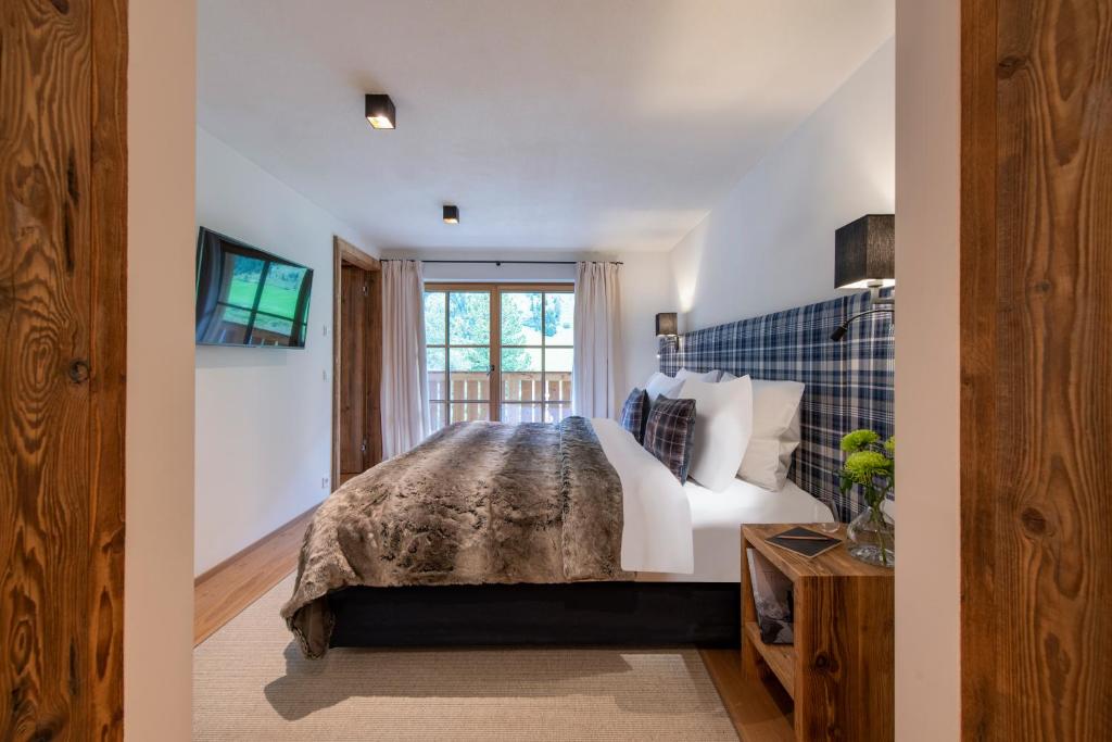 Postel nebo postele na pokoji v ubytování Brunnenhof Luxury Apartments