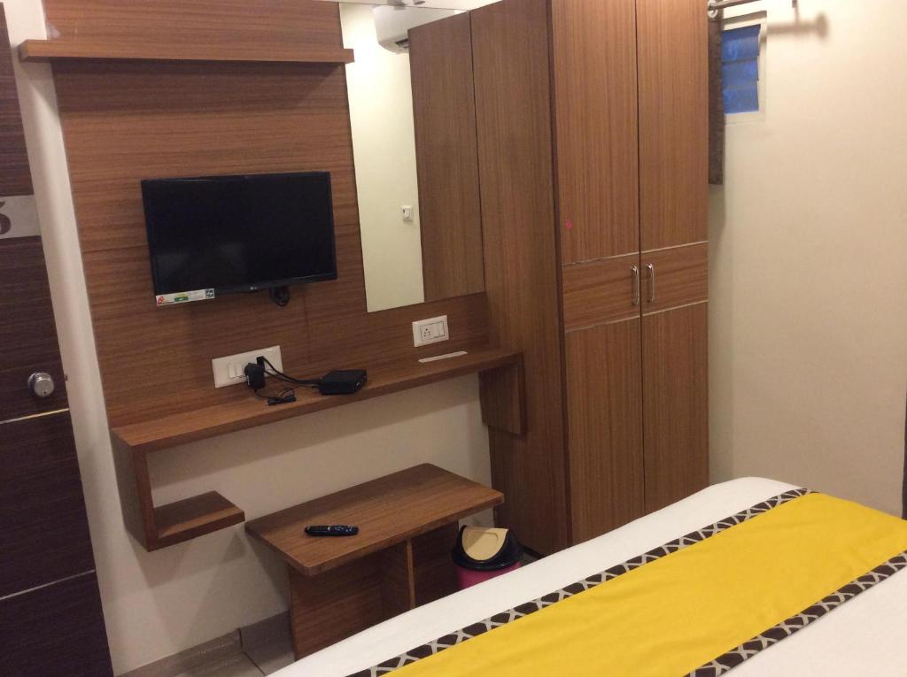 Postel nebo postele na pokoji v ubytování HOTEL RK PALACE