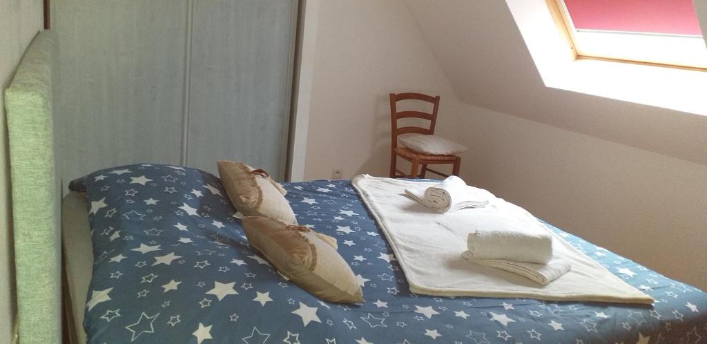 Postel nebo postele na pokoji v ubytování Le Cocon Breton