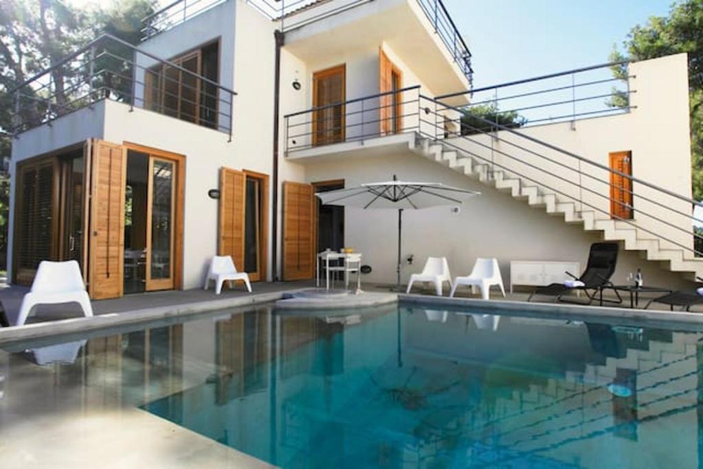 Kolam renang di atau dekat dengan 5 bedrooms villa with sea view private pool and furnished garden at Altavilla Milicia 1 km away from the beach
