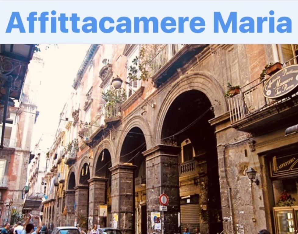 vistas a una calle de una ciudad con edificios en B&B Da Maria en Nápoles