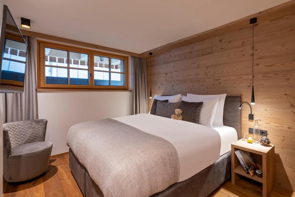 Postel nebo postele na pokoji v ubytování Brunnenhof Luxury Apartments