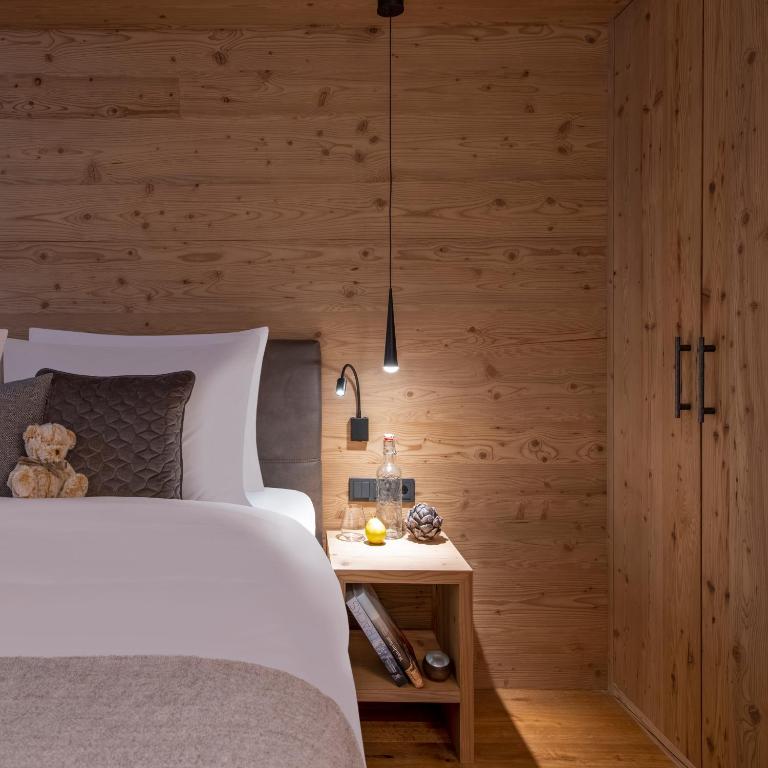 Postel nebo postele na pokoji v ubytování Brunnenhof Luxury Apartments