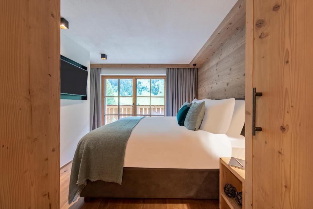 Postel nebo postele na pokoji v ubytování Brunnenhof Luxury Apartments