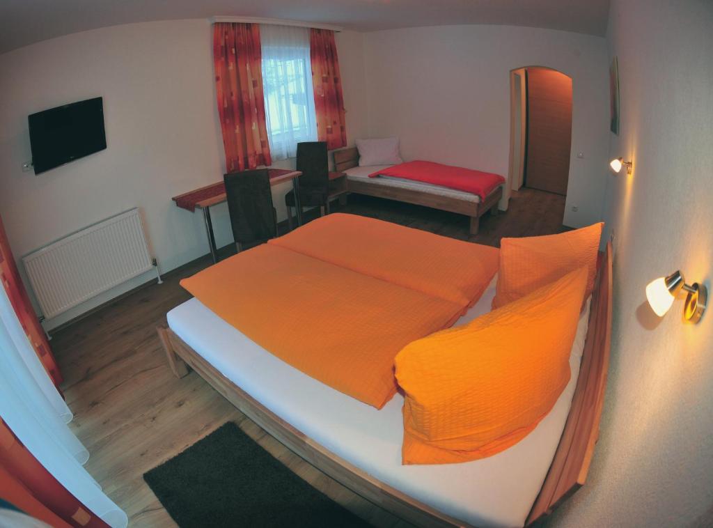 Postel nebo postele na pokoji v ubytování Haus Scheiber