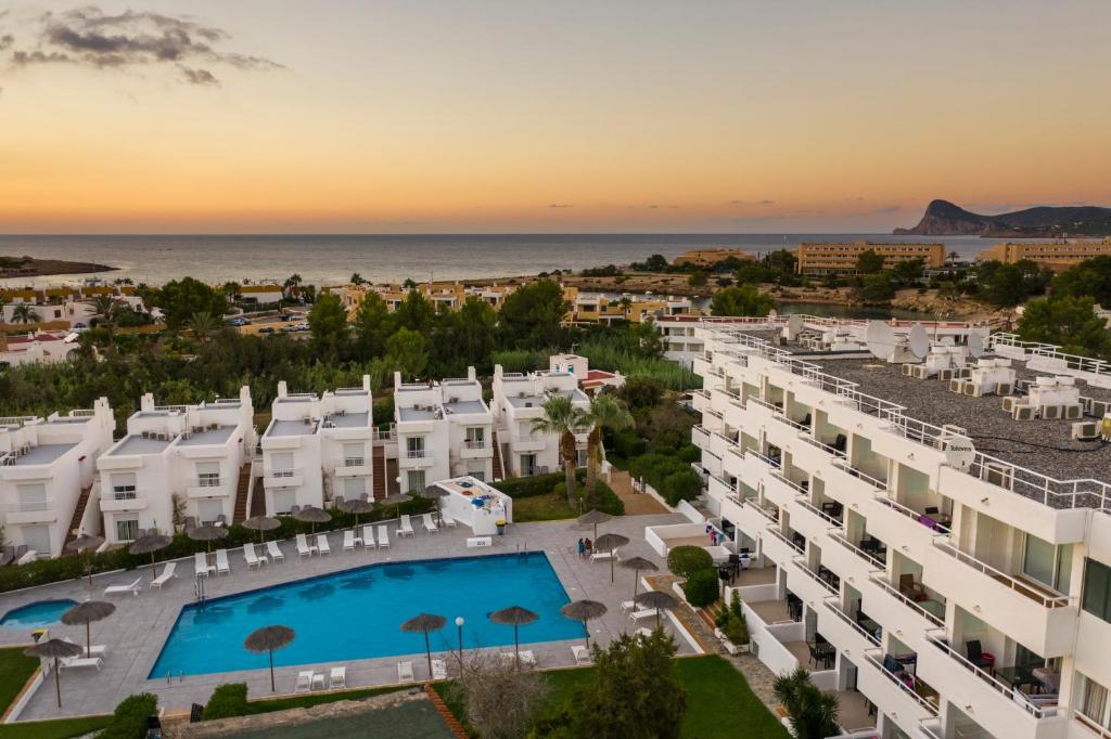 an aerial view of a resort with a swimming pool at Camelina Suites in San Antonio Bay