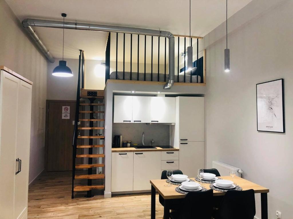 Kuchyň nebo kuchyňský kout v ubytování Property Apart - Soft Lofty Legnicka Centrum