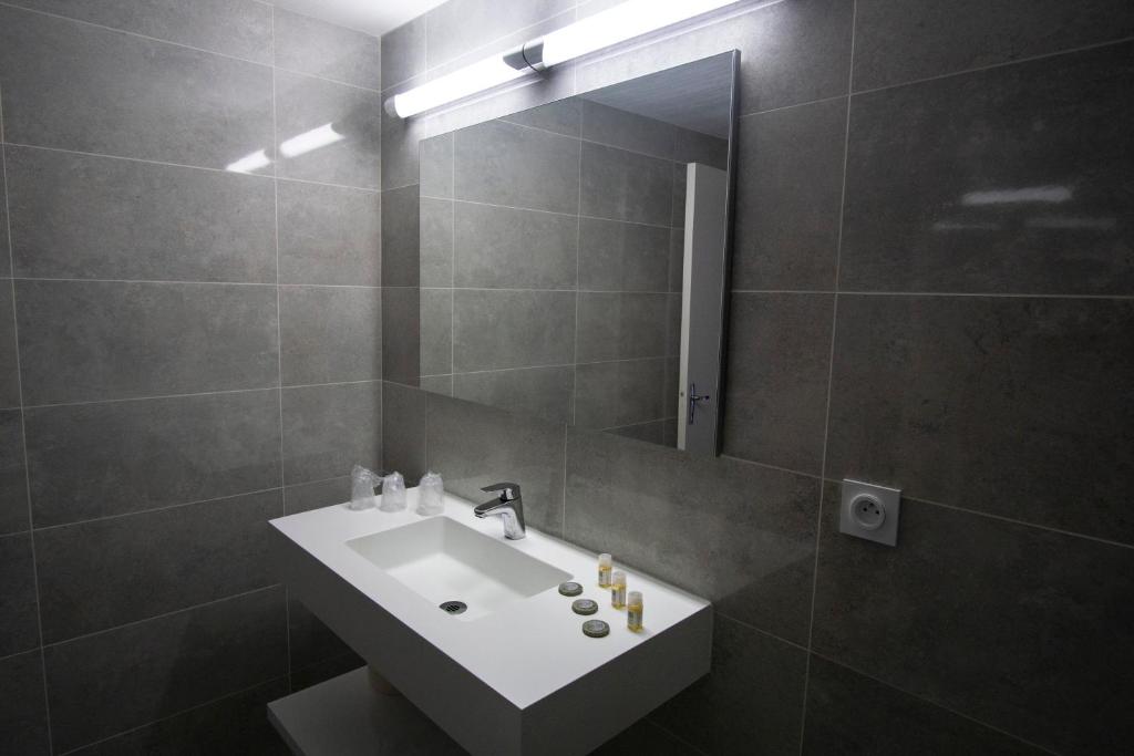 Koupelna v ubytování Hôtel Pyrène