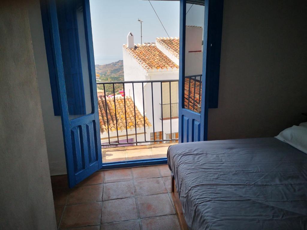 Postel nebo postele na pokoji v ubytování Casa David