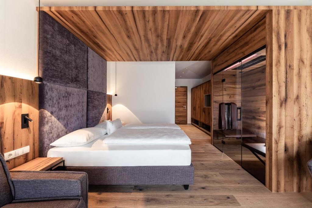 Postel nebo postele na pokoji v ubytování B&B Boutiquehotel Clara