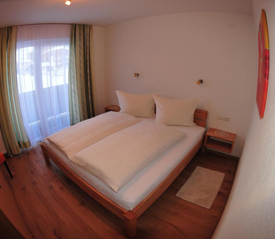 Postel nebo postele na pokoji v ubytování Haus Scheiber