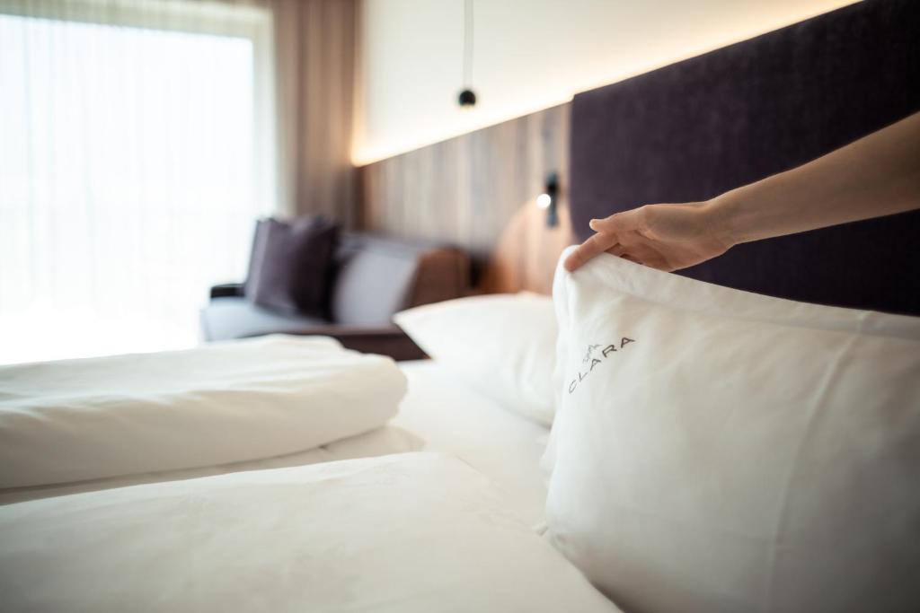 Postel nebo postele na pokoji v ubytování B&B Boutiquehotel Clara