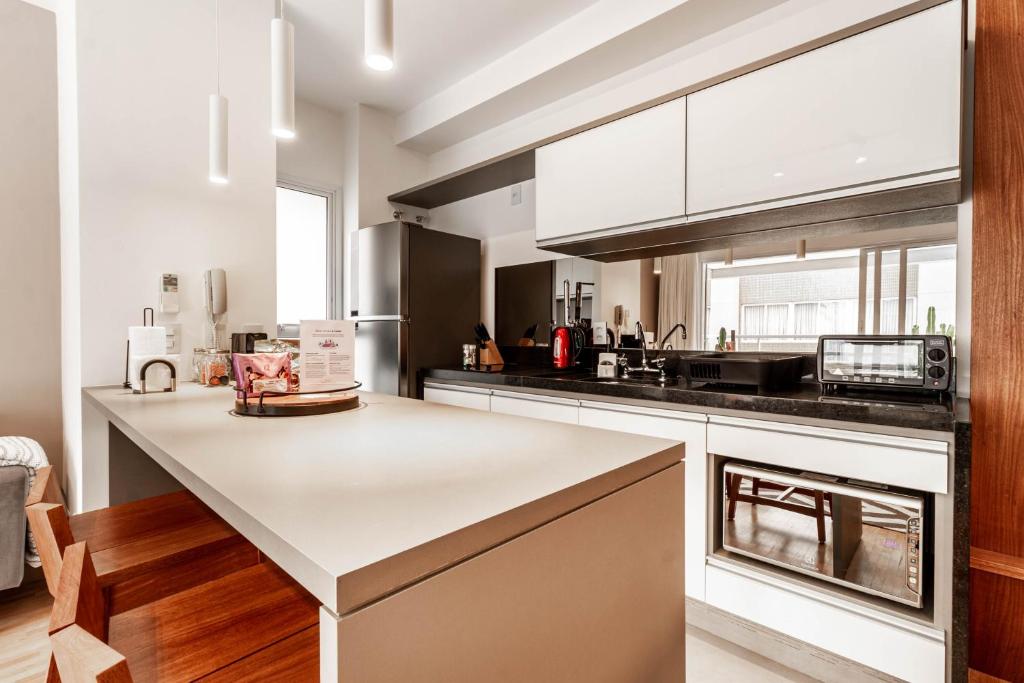 Apartamento estiloso com terraço privativo - Jardim Paulista