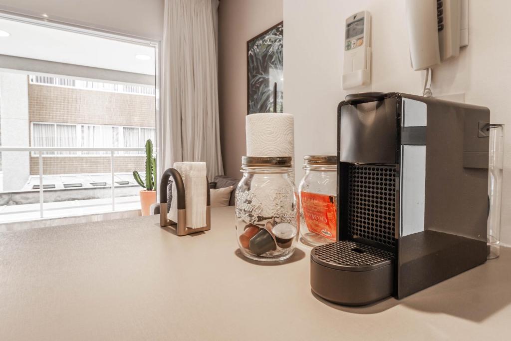 Apartamento estiloso com terraço privativo - Jardim Paulista