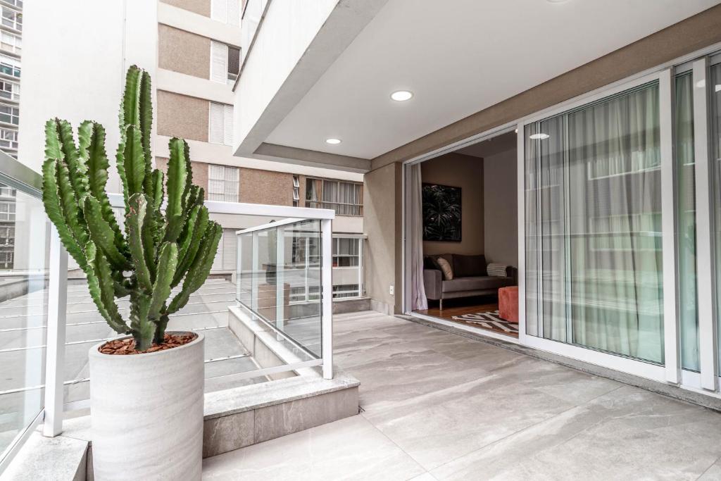  Apartamento estiloso com terraço privativo - Jardim Paulista