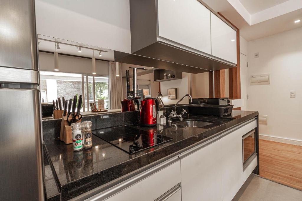  Apartamento estiloso com terraço privativo - Jardim Paulista