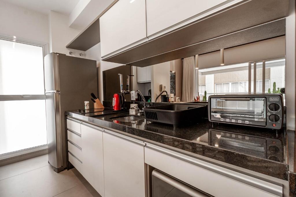  Apartamento estiloso com terraço privativo - Jardim Paulista
