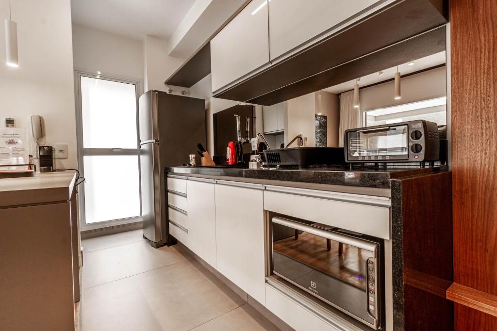 Apartamento estiloso com terraço privativo - Jardim Paulista