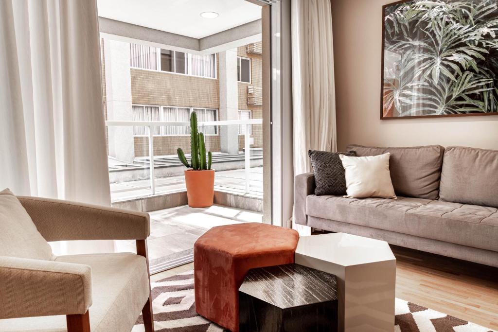  Apartamento estiloso com terraço privativo - Jardim Paulista