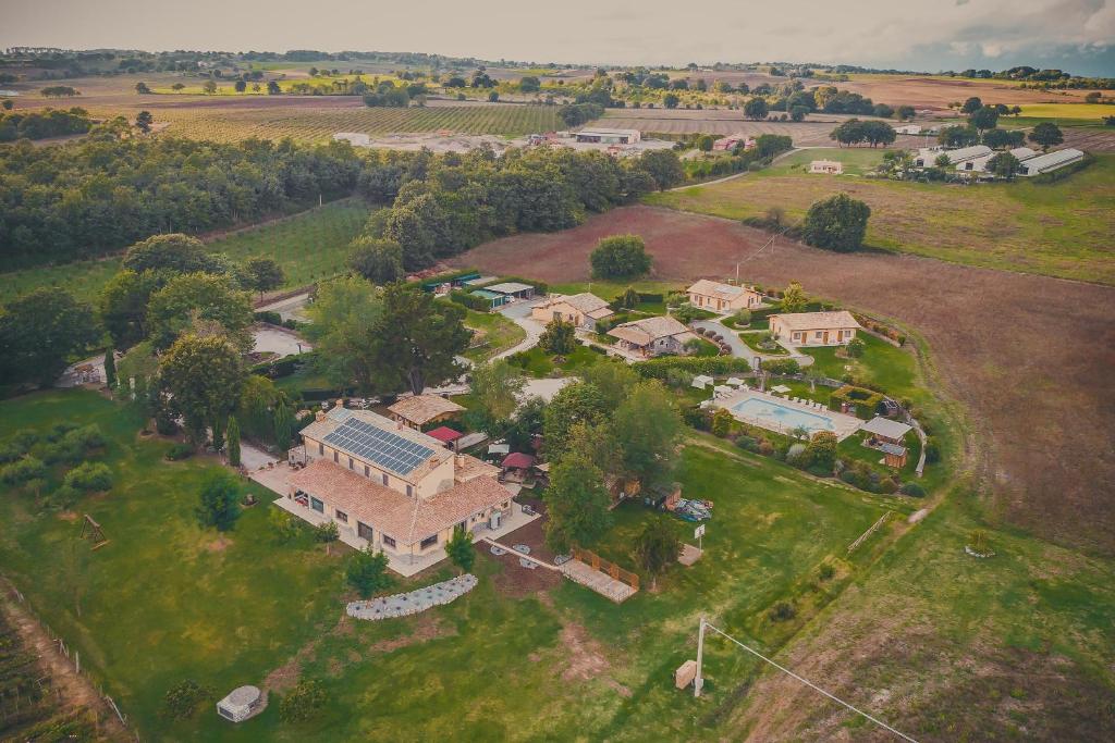 an aerial view of a large house on a field at Agriturismo Buonasera in Bagnoregio