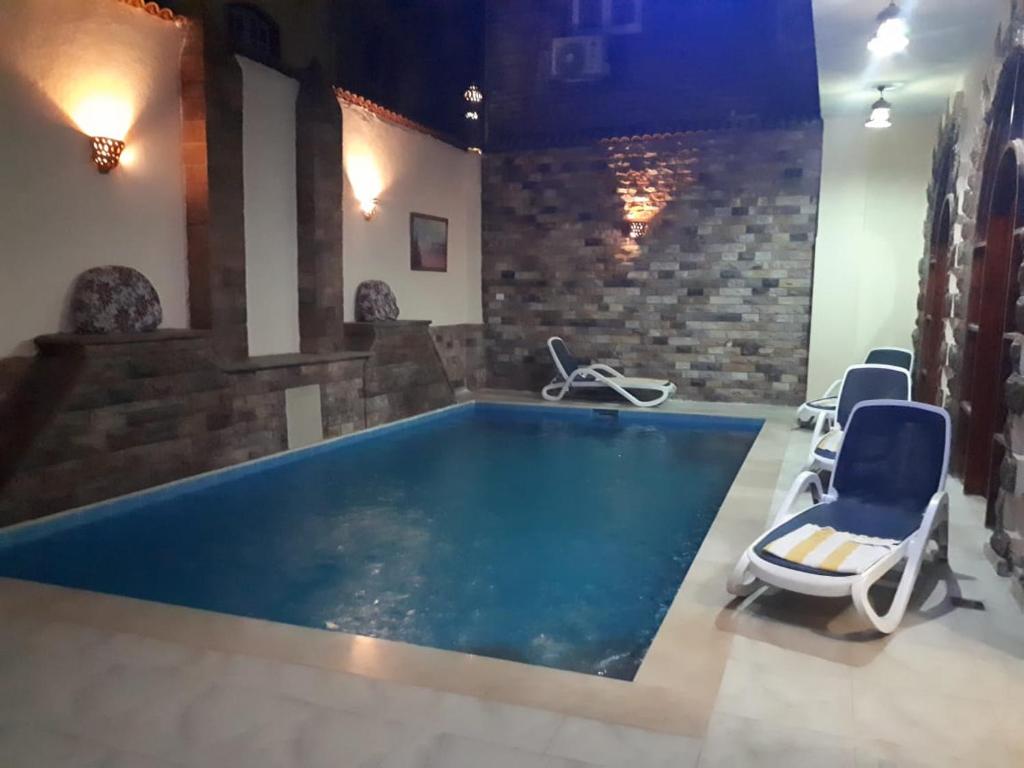The swimming pool at or close to Pyramids Luxor Hotel & SPA