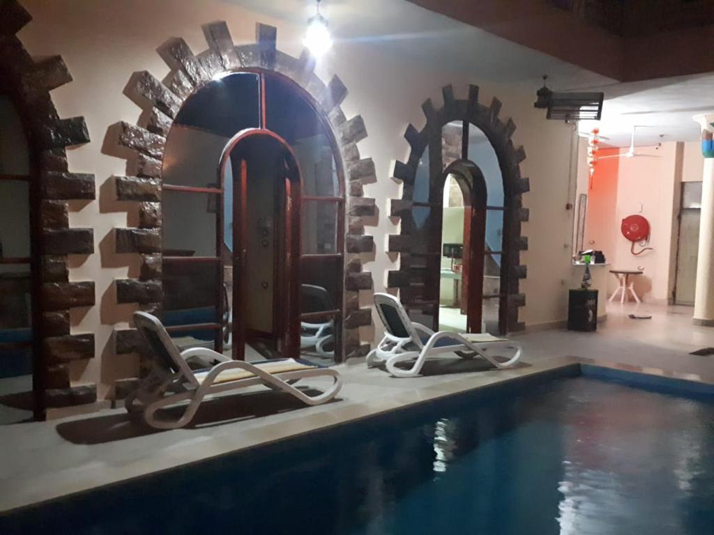 The swimming pool at or close to Pyramids Luxor Hotel & SPA