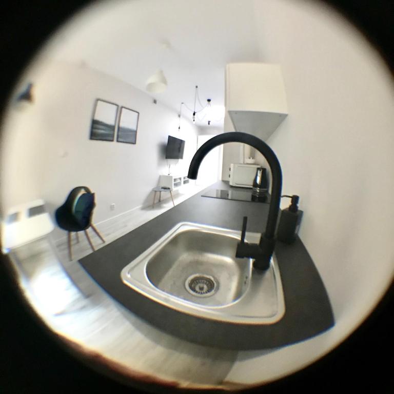 Łazienka w obiekcie Apartamenty Długa 6