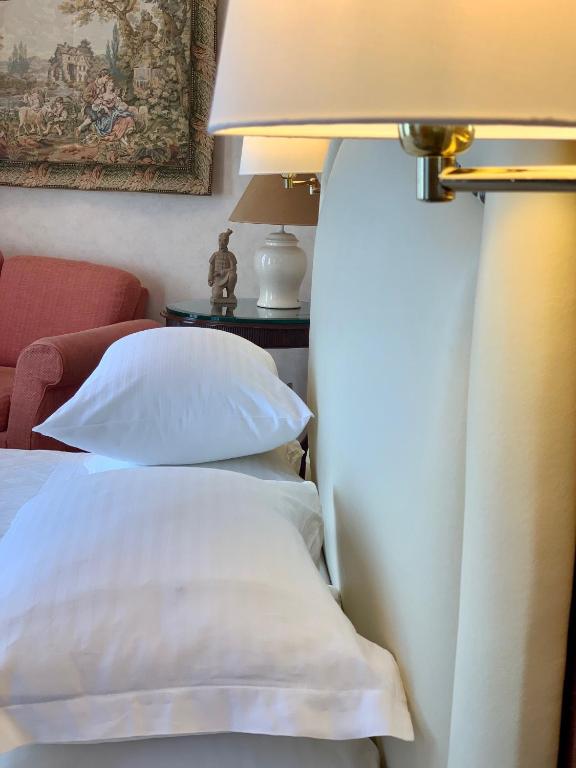 Postel nebo postele na pokoji v ubytování Thermae Sylla Spa & Wellness Hotel