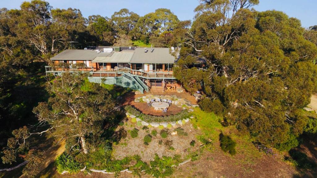 an aerial view of a house with a garden at Allusion Farmstay Cellar House Heated Pool - Fire Pit - Pizza Oven - Pool Table - Sleeps 16 in Yankalilla