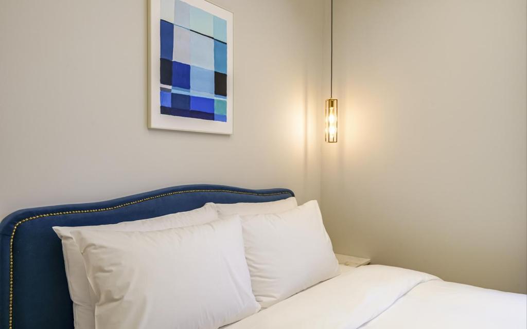 Postel nebo postele na pokoji v ubytování GijangYeonhwari No,25 Hotel