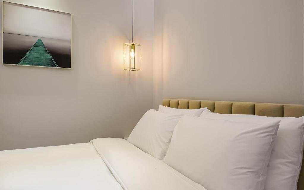 Postel nebo postele na pokoji v ubytování GijangYeonhwari No,25 Hotel