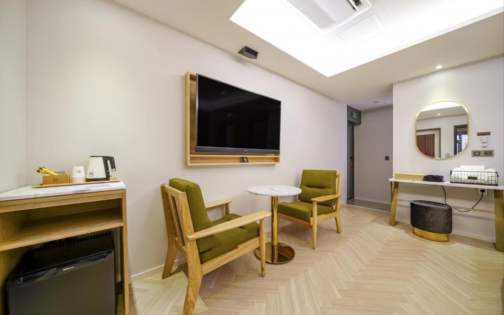 Kuchyň nebo kuchyňský kout v ubytování GijangYeonhwari No,25 Hotel