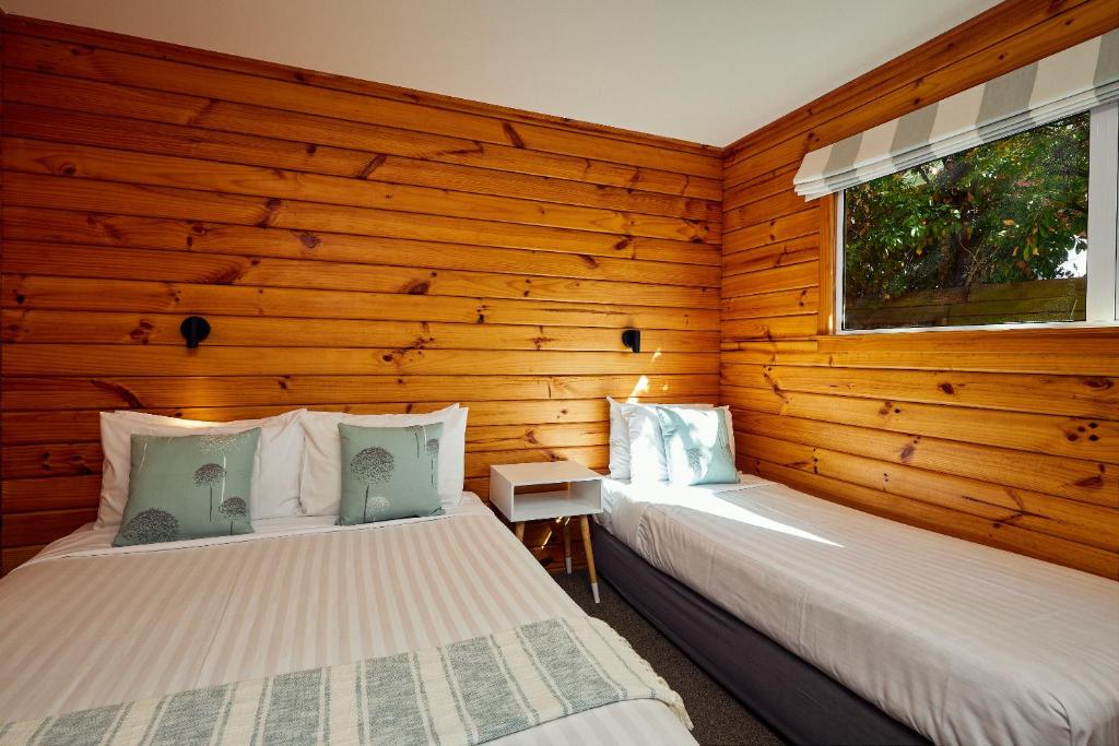 Postel nebo postele na pokoji v ubytování Panorama Motel