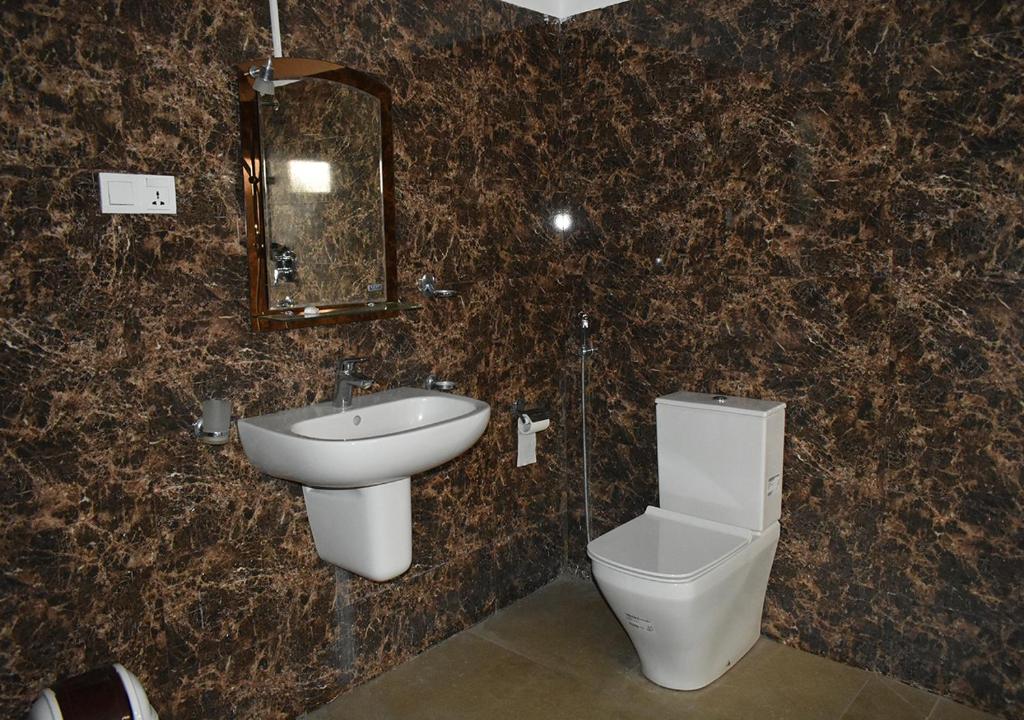 Koupelna v ubytování Capital Resort Inn